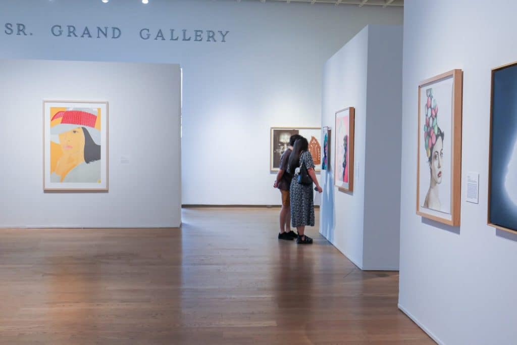A couple on a date in an art gallery.