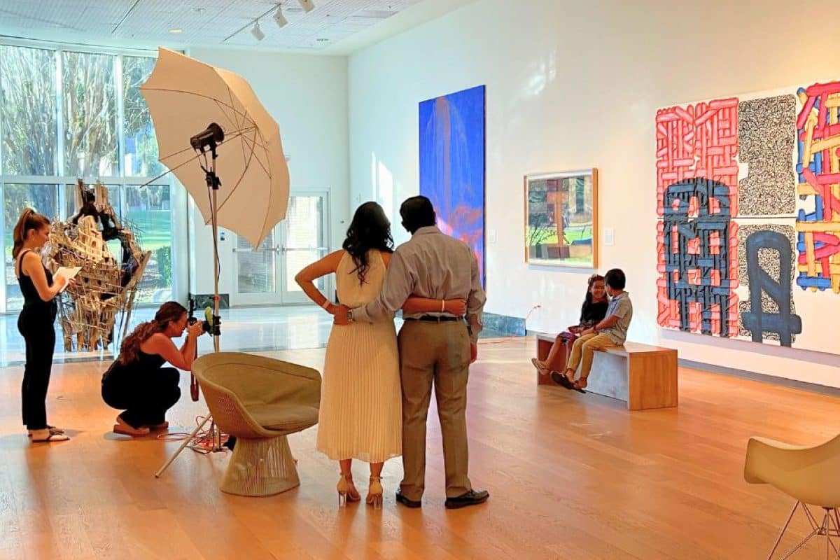 Museum goers having portraits done in the gallery