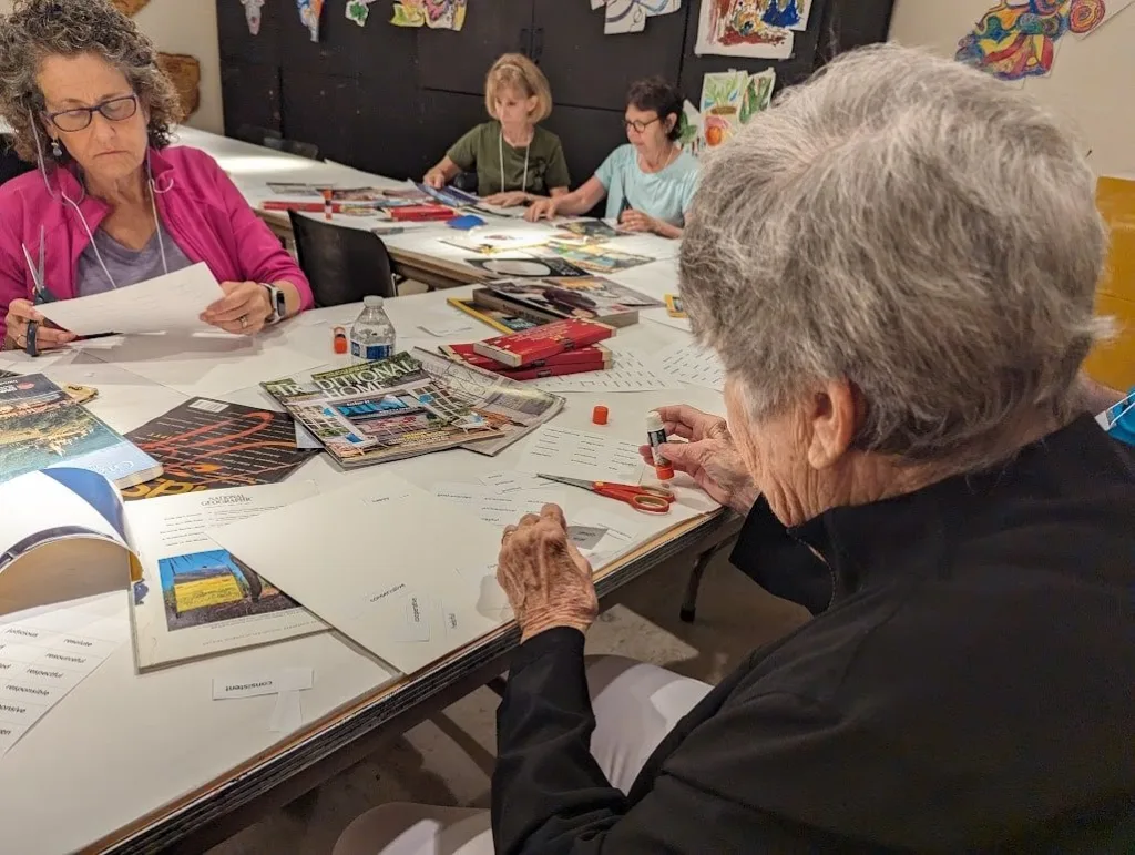 community members working on art