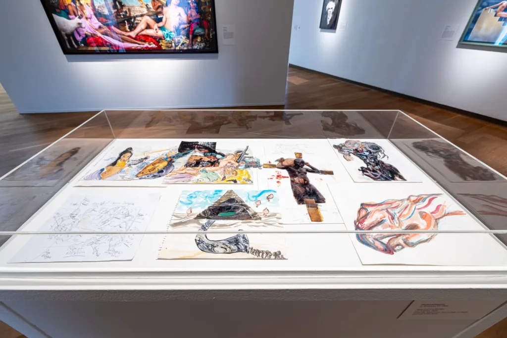 an install shot of behind the scenes sketches from David LaChapelle at the Orlando Museum of Art